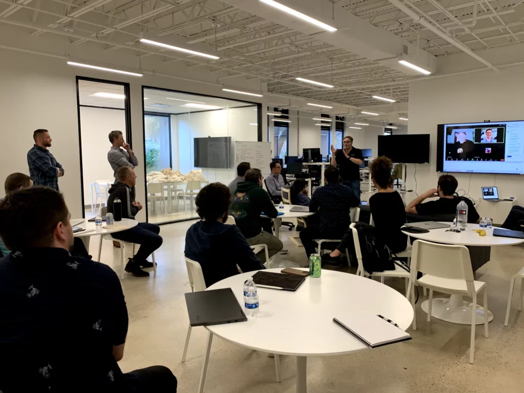 An Evocalize all-hands meeting in the office
