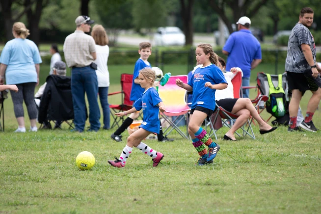 get involved in your community for real estate: youth soccer team