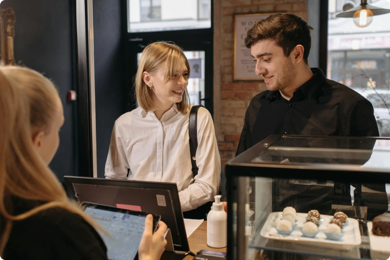 Win local customers with craveworthy marketing - Couple ordering at a register
