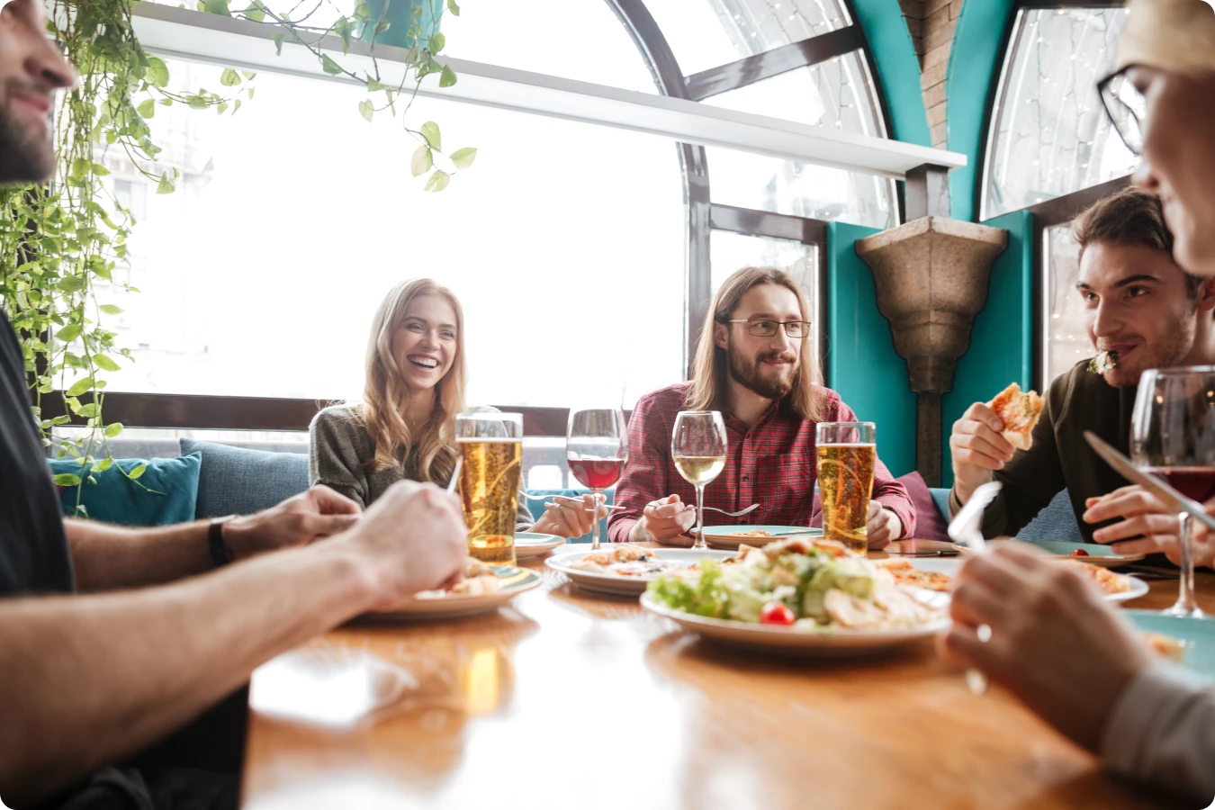 Prioritize the customer experience: Friends eating at a restaurant