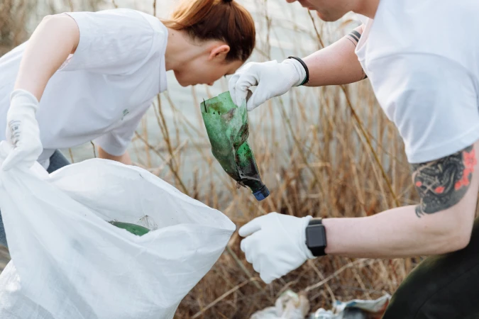 Volunteers cleaning up trash and litter