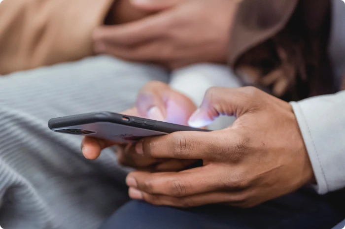 Person sending a text message