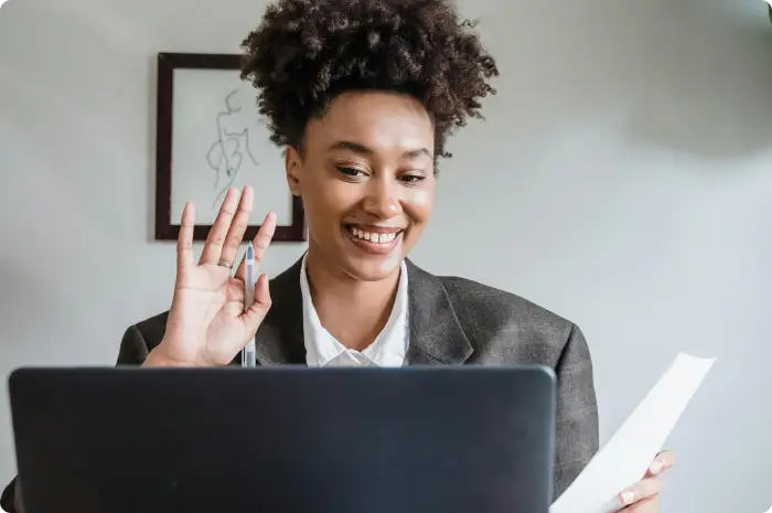 Person recording a video on their laptop
