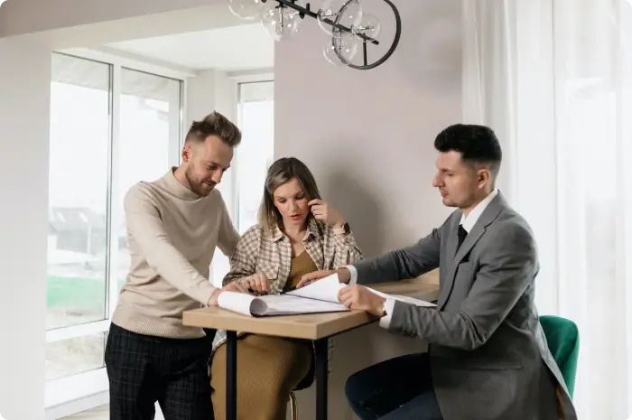 Couple working with a real estate agent